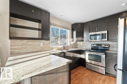 9614 120 Avenue, Edmonton, AB - Indoor Photo Showing Kitchen With Stainless Steel Kitchen With Double Sink With Upgraded Kitchen