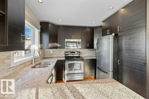 9614 120 Avenue, Edmonton, AB - Indoor Photo Showing Kitchen With Stainless Steel Kitchen With Double Sink With Upgraded Kitchen