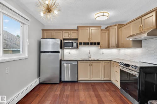 202 10746 80 Avenue, Edmonton, AB - Indoor Photo Showing Kitchen With Stainless Steel Kitchen With Upgraded Kitchen