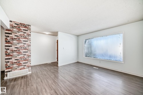 9623/9625 73 Avenue Nw, Edmonton, AB - Indoor Photo Showing Kitchen With Stainless Steel Kitchen With Double Sink