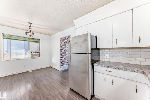 9623/9625 73 Avenue Nw, Edmonton, AB - Indoor Photo Showing Kitchen With Stainless Steel Kitchen With Double Sink With Upgraded Kitchen