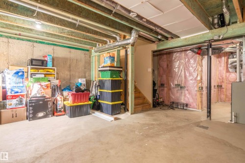 Unfinished below grade area with stairs - 13 5317 3 Avenue, Edmonton, AB - Indoor Photo Showing Basement