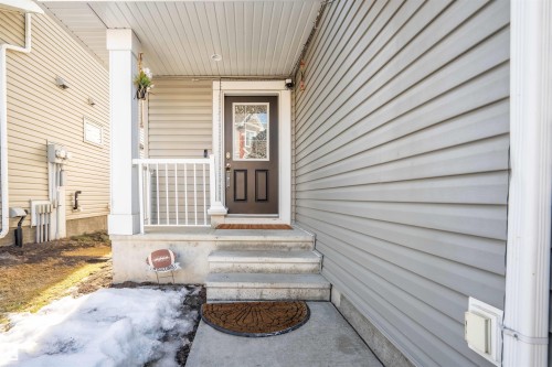 Property entrance featuring covered porch - 13 5317 3 Avenue, Edmonton, AB - Outdoor