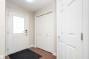 Doorway with wood finished floors and a textured ceiling - 13 5317 3 Avenue, Edmonton, AB  - Indoor Photo Showing Other Room 