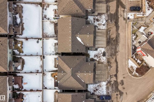 View of snowy aerial view - 13 5317 3 Avenue, Edmonton, AB -  Photo Showing Basement