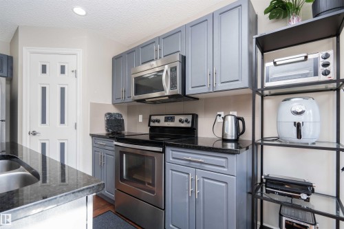13 5317 3 Avenue, Edmonton, AB - Indoor Photo Showing Kitchen With Stainless Steel Kitchen With Double Sink