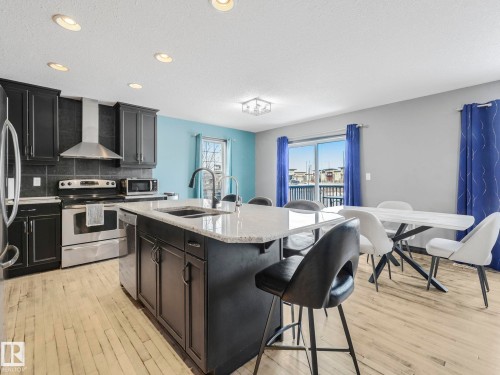 60 Becker Crescent, Fort Saskatchewan, AB - Indoor Photo Showing Kitchen With Stainless Steel Kitchen With Double Sink