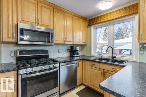7123 82 Street, Edmonton, AB - Indoor Photo Showing Kitchen With Double Sink