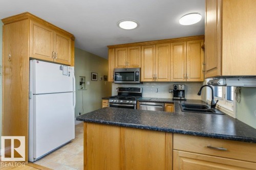 7123 82 Street, Edmonton, AB - Indoor Photo Showing Kitchen With Double Sink