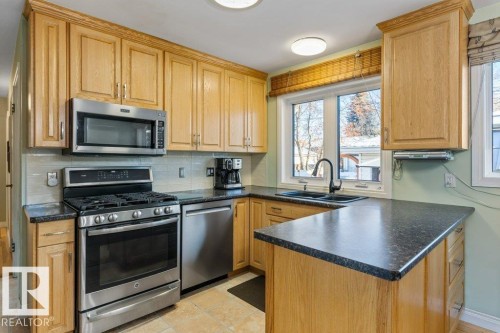 7123 82 Street, Edmonton, AB - Indoor Photo Showing Kitchen With Double Sink