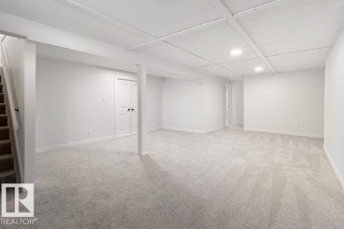 Finished basement featuring light carpet and recessed lighting - 875 Juniper Avenue, Sherwood Park, AB - Indoor Photo Showing Other Room