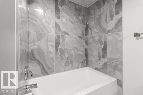 Bathroom featuring tub / shower combination - 875 Juniper Avenue, Sherwood Park, AB - Indoor Photo Showing Bathroom