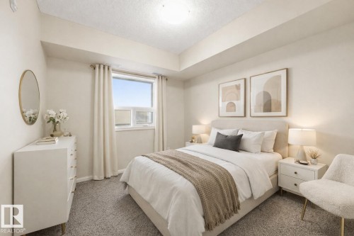 Photo has virtual staging - 304 9819 104 Street, Edmonton, AB - Indoor Photo Showing Bedroom