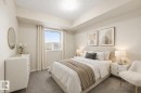 Photo has virtual staging - 304 9819 104 Street, Edmonton, AB  - Indoor Photo Showing Bedroom 