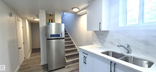 12916 123A Street, Edmonton, AB - Indoor Photo Showing Kitchen With Double Sink