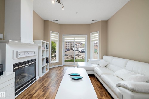 126 4312 139 Avenue, Edmonton, AB - Indoor Photo Showing Living Room With Fireplace
