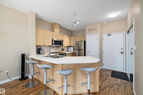 126 4312 139 Avenue, Edmonton, AB - Indoor Photo Showing Kitchen With Stainless Steel Kitchen With Double Sink