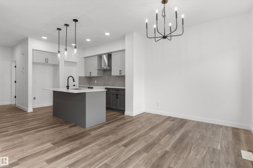 928 18 Avenue, Edmonton, AB - Indoor Photo Showing Kitchen With Upgraded Kitchen