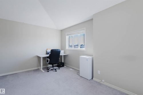Office area with vaulted ceiling and light colored carpet - 3534 Mclean Crescent, Edmonton, AB - Indoor