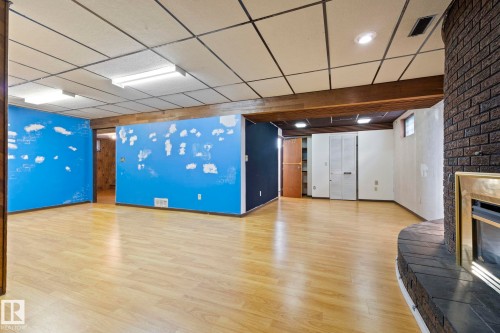 12023 137 Avenue, Edmonton, AB - Indoor Photo Showing Other Room With Fireplace