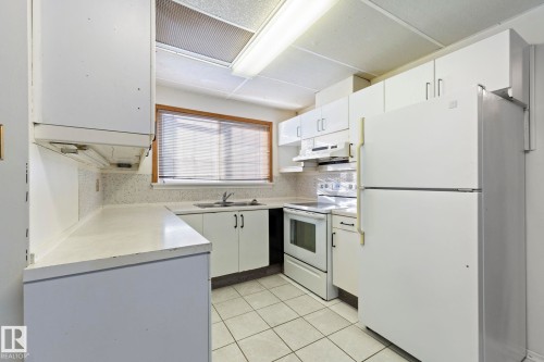 12023 137 Avenue, Edmonton, AB - Indoor Photo Showing Kitchen With Double Sink