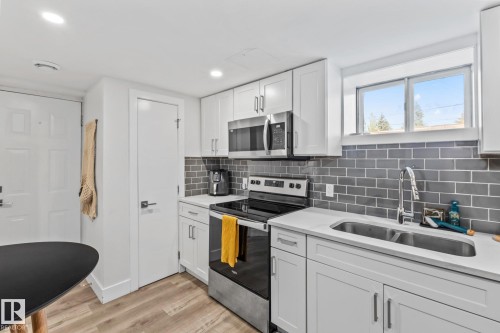 11420 112 Avenue, Edmonton, AB - Indoor Photo Showing Kitchen With Stainless Steel Kitchen With Double Sink