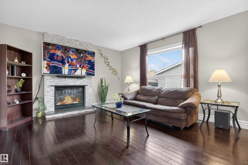3907 44 Avenue, Stony Plain, AB - Indoor Photo Showing Living Room With Fireplace