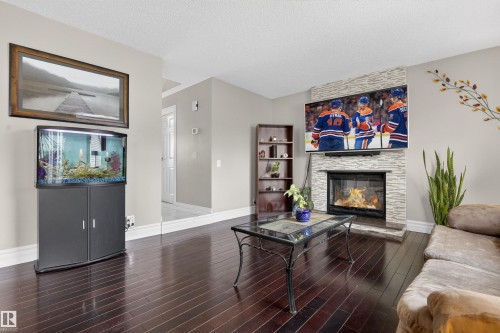 3907 44 Avenue, Stony Plain, AB - Indoor Photo Showing Living Room With Fireplace