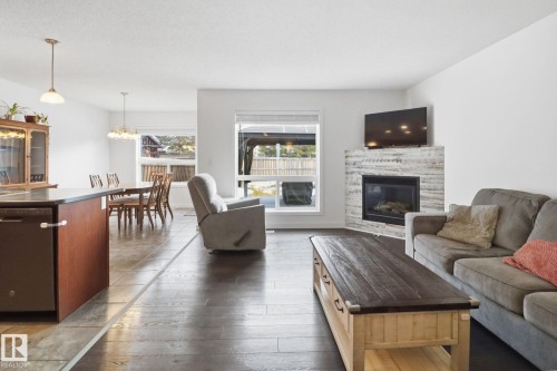 9037 Scott Crescent, Edmonton, AB - Indoor Photo Showing Living Room With Fireplace