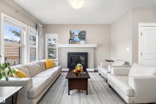 19 Gilmore Way, Spruce Grove, AB - Indoor Photo Showing Living Room With Fireplace