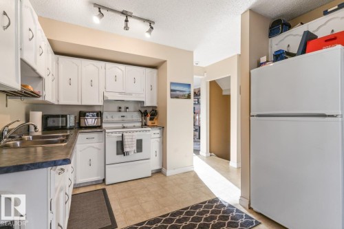 1257 Hooke Road, Edmonton, AB - Indoor Photo Showing Kitchen With Double Sink