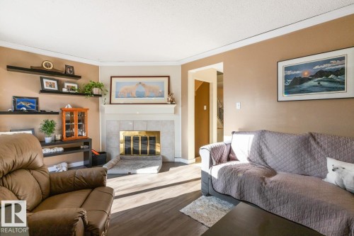 1257 Hooke Road, Edmonton, AB - Indoor Photo Showing Living Room With Fireplace