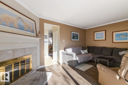 1257 Hooke Road, Edmonton, AB - Indoor Photo Showing Living Room With Fireplace