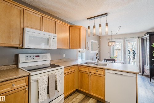 66 Grayridge Crescent, Stony Plain, AB - Indoor Photo Showing Kitchen With Double Sink