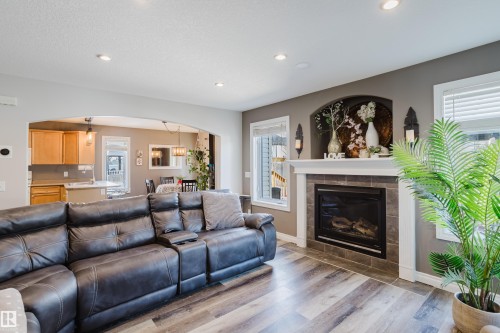 66 Grayridge Crescent, Stony Plain, AB - Indoor Photo Showing Living Room With Fireplace
