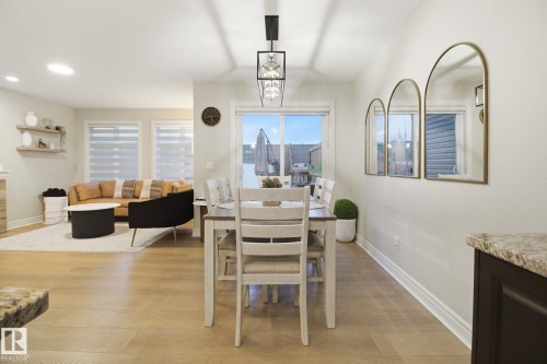1418 169 Street, Edmonton, AB - Indoor Photo Showing Dining Room With Fireplace