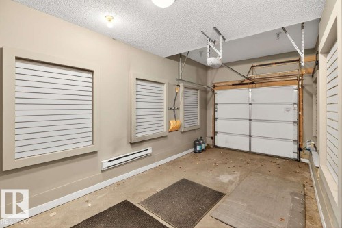 63 14208 36 Street, Edmonton, AB - Indoor Photo Showing Garage