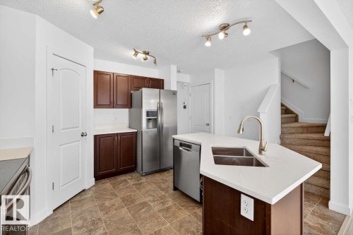 63 14208 36 Street, Edmonton, AB - Indoor Photo Showing Kitchen With Double Sink