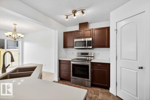 63 14208 36 Street, Edmonton, AB - Indoor Photo Showing Kitchen With Double Sink