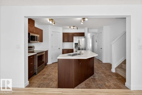 63 14208 36 Street, Edmonton, AB - Indoor Photo Showing Kitchen With Double Sink