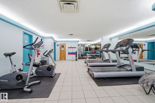 Workout area featuring a textured ceiling - 1312 13910 Stony Plain Road, Edmonton, AB - Indoor Photo Showing Gym Room
