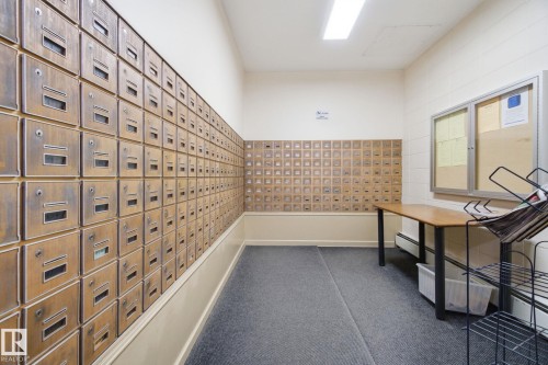 Surrounding community featuring mail area - 1312 13910 Stony Plain Road, Edmonton, AB - Indoor Photo Showing Other Room