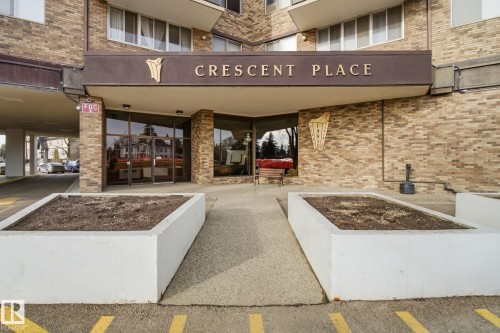 Entrance to property with brick siding - 1312 13910 Stony Plain Road, Edmonton, AB - Outdoor