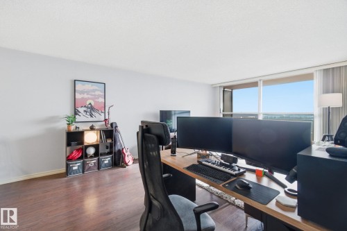 Office with wood finished floors and baseboards - 1312 13910 Stony Plain Road, Edmonton, AB - Indoor Photo Showing Office