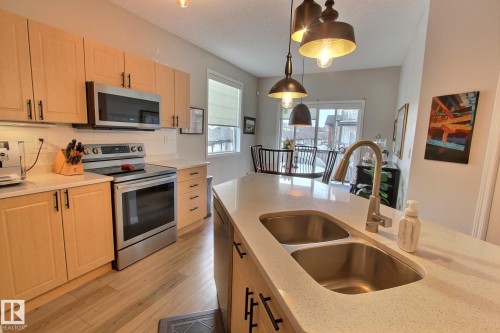 26 4821 Terwillegar Common, Edmonton, AB - Indoor Photo Showing Kitchen With Double Sink