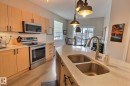 26 4821 Terwillegar Common, Edmonton, AB  - Indoor Photo Showing Kitchen With Double Sink 
