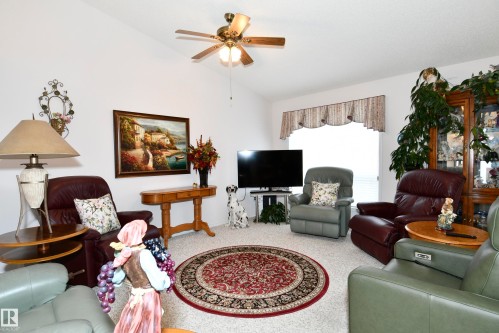 5 102 Bridgeport Crossing, Leduc, AB - Indoor Photo Showing Living Room