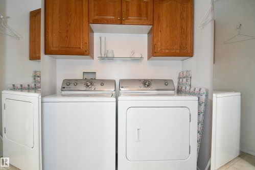 5 102 Bridgeport Crossing, Leduc, AB - Indoor Photo Showing Laundry Room