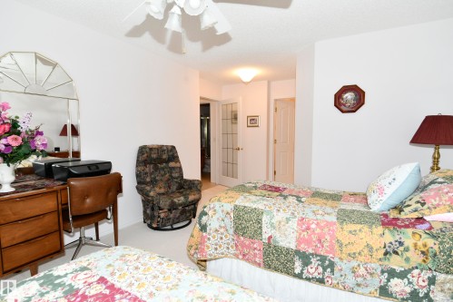 5 102 Bridgeport Crossing, Leduc, AB - Indoor Photo Showing Bedroom