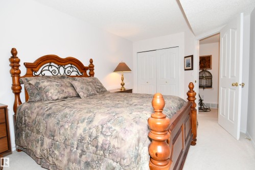 5 102 Bridgeport Crossing, Leduc, AB - Indoor Photo Showing Bedroom